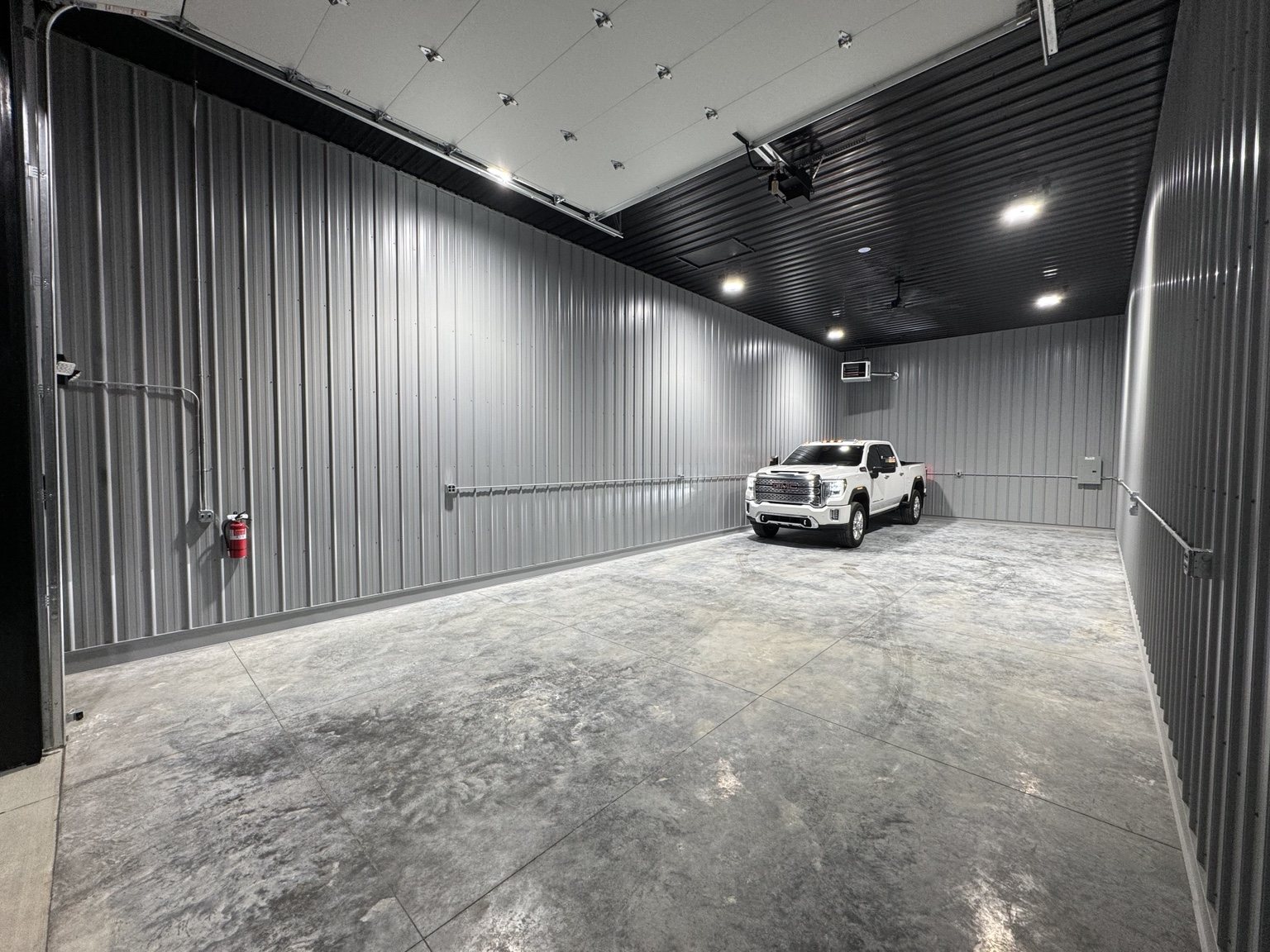 Akron commercial garage bay with full-size truck showing interior scale